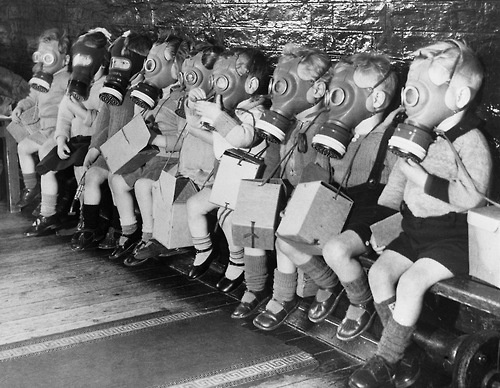 children in gas masks