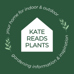 the logo is a dark green square, with a white pentagon in the center symbolizing a house. In the center of that reads KATE READS PLANTS in all caps and dark green print. Forming a circle around the pentagon in white print is the tagline: Your home for indoor and outdoor gardening information and inspiration. 